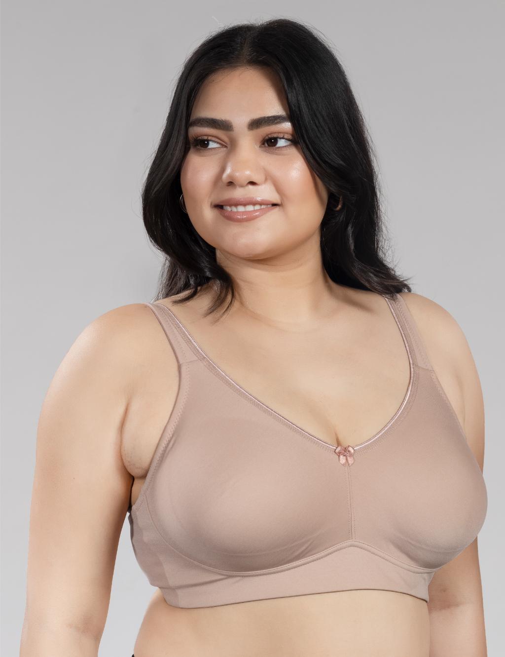 Image of Skin tone SleekForm Minimizer Bra seamless shaping under t-shirt